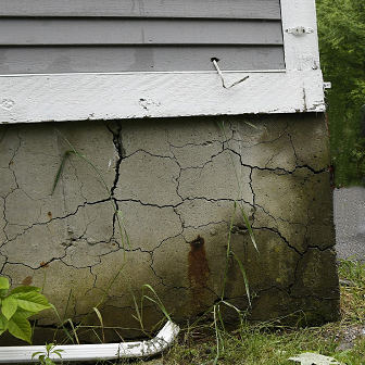 House with crumbling foundation