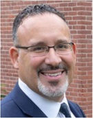 Dr. Miguel A. Cardona